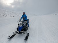 Snowmobiles are essential for getting around outside the city. photo by @Tom Jůnek